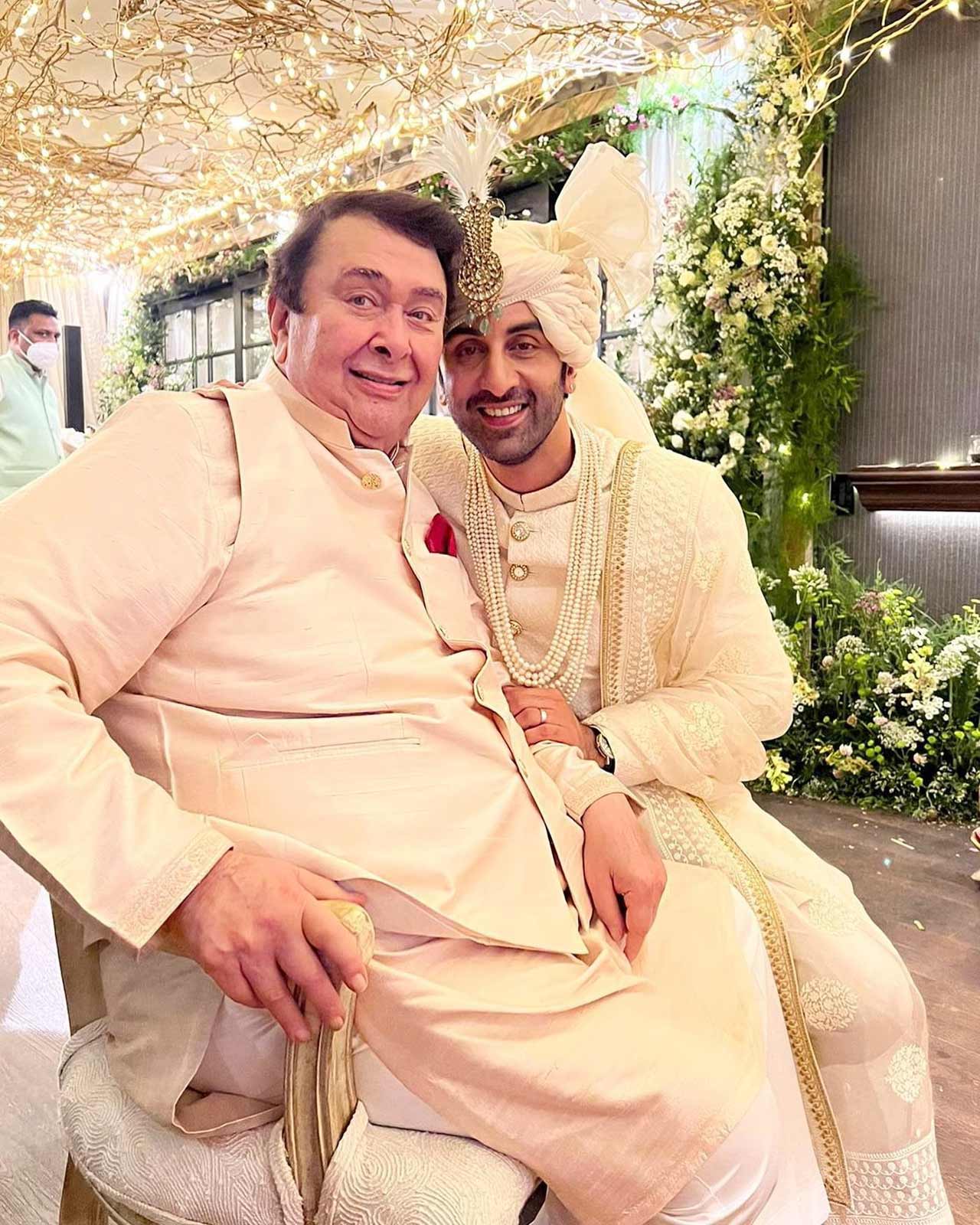 The pre-wedding festivities including a special pooja and mehendi ceremony were conducted on Wednesday. Several guests including Ranbir's mother Neetu Kapoor, sister Riddhima Kapoor Sahni, cousins Kareena Kapoor Khan, Karisma Kapoor, and aunt Reema Kapoor were dressed to the nines for the event.
In picture: Ranbir Kapoor with Karisma Kapoor and Kareena Kapoor's father Randhir Kapoor