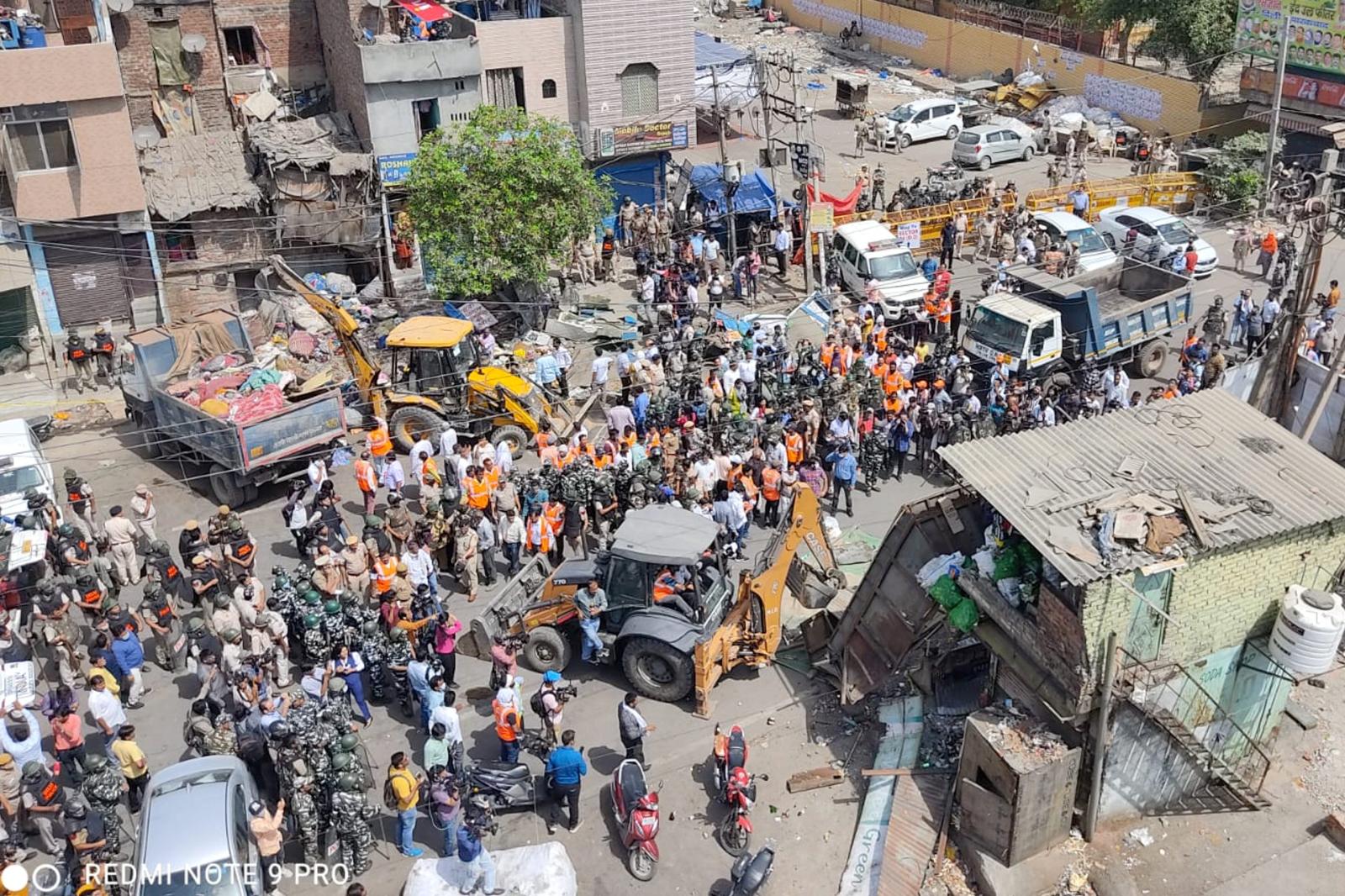 After an hour after the bulldozers reached Jahangirpuri area in New Delhi to begin an anti-encroachment drive, the Supreme Court halted the excercise and said it would take up the matter for hearing on Thursday. The top court has ordered status quo till then. The demolition drive comes days after communal clashes broke out in the area