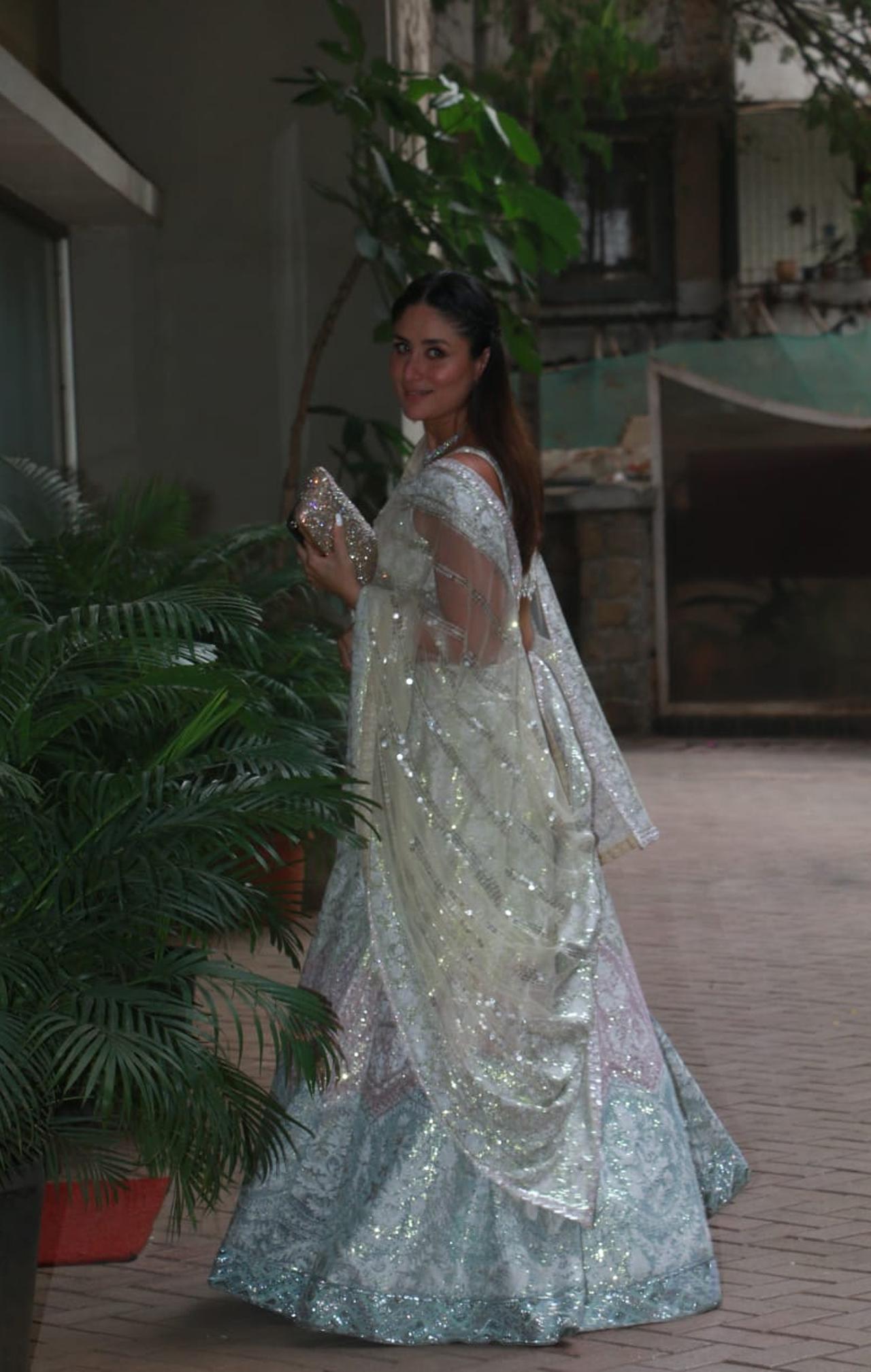 Kareena Kapoor Khan slayed with her silver lehenga as she too got clicked outside Ranbir Kapoor's home. She smiled away at the paparazzi and as always, looked radiant.