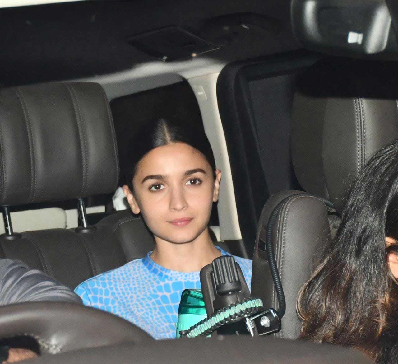 Karan Johar hosted a bash for Netflix CEO Bella Bajaria and the party was attended by the producer's BFFs. Alia was seen wearing a pretty blue dress at the celebration.