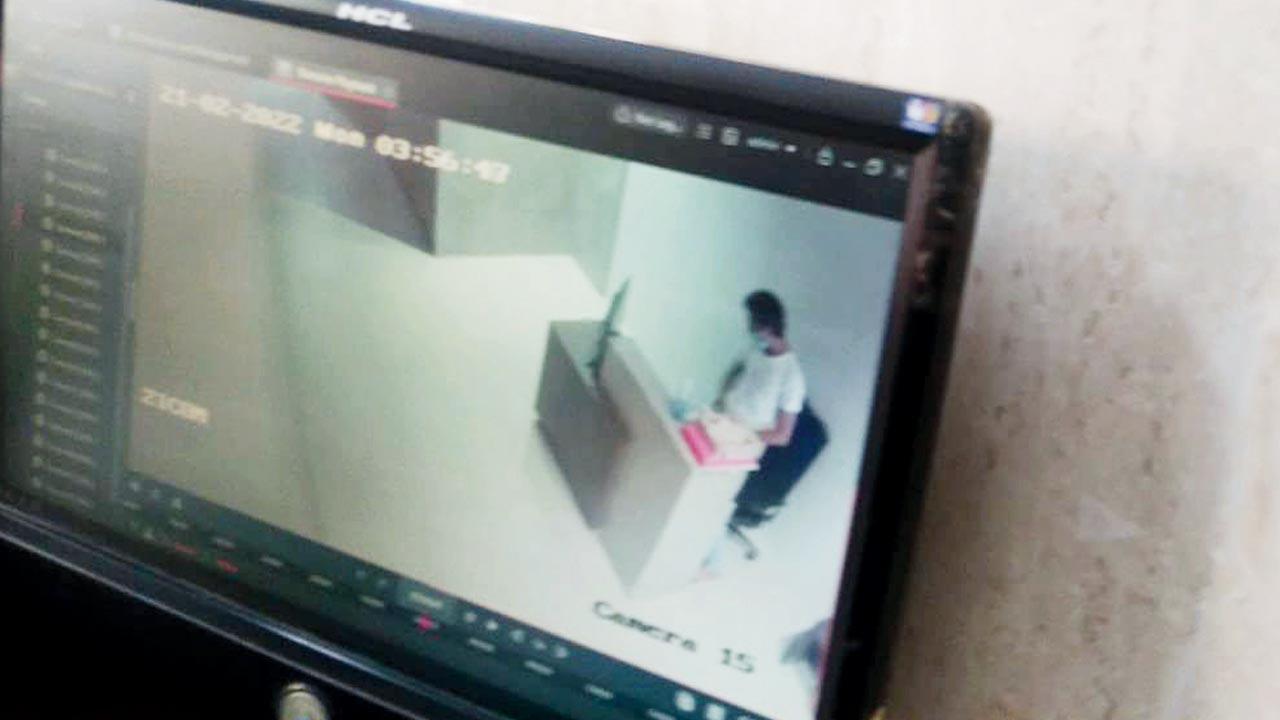 A burglar checks the CCTV cameras at a SoBo society in Feb