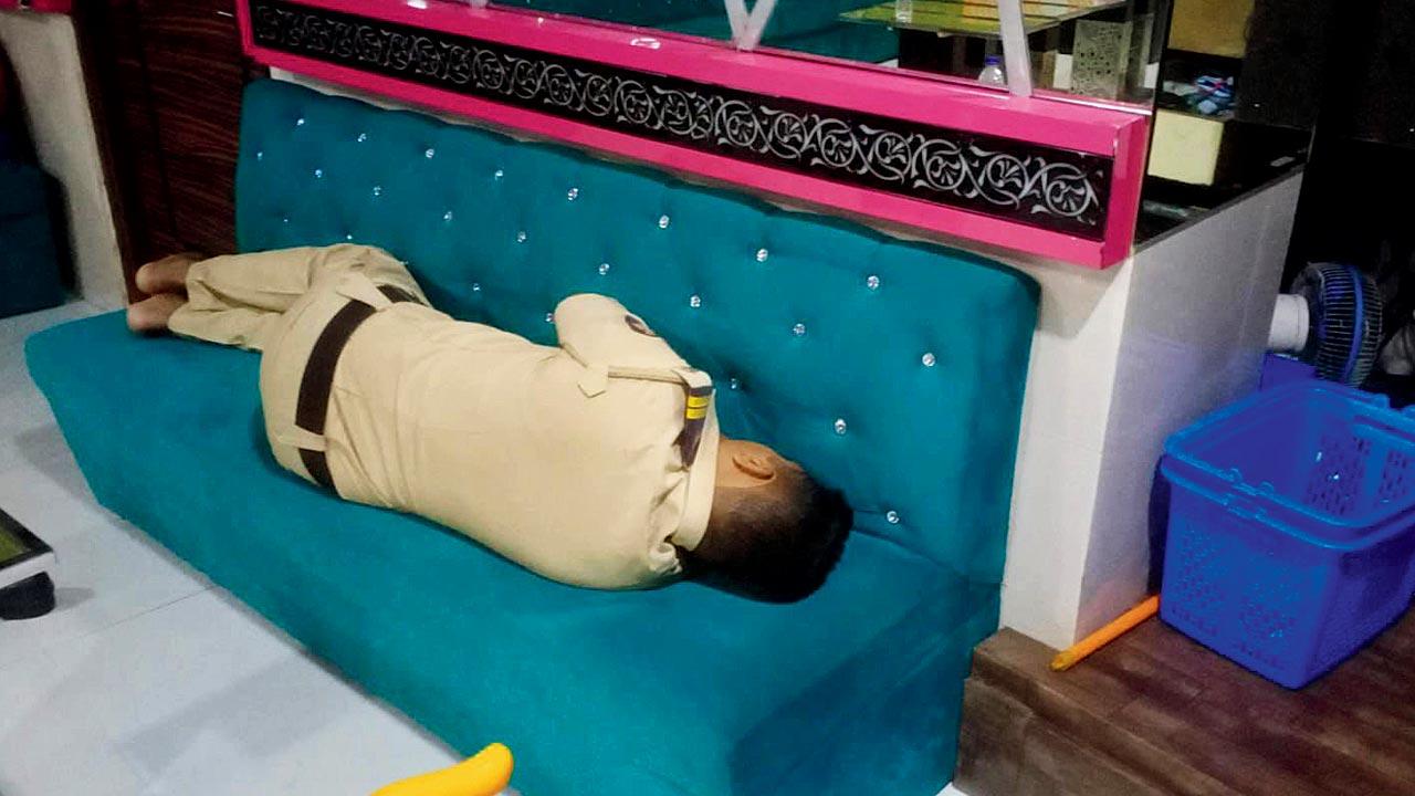 A police personnel found sound asleep at a bar in Andheri around 5.48 am on December 20, 2021