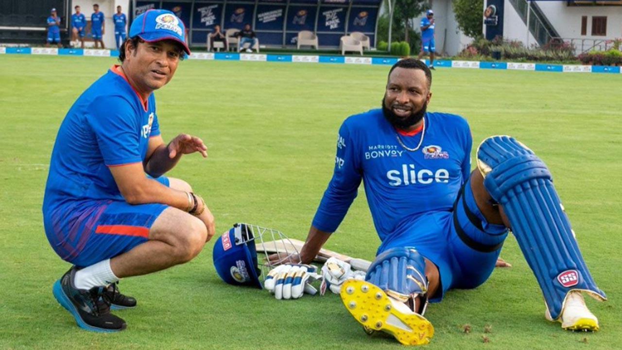 Sachin Tendulkar congratulates Kieron Pollard on his retirement from international cricket