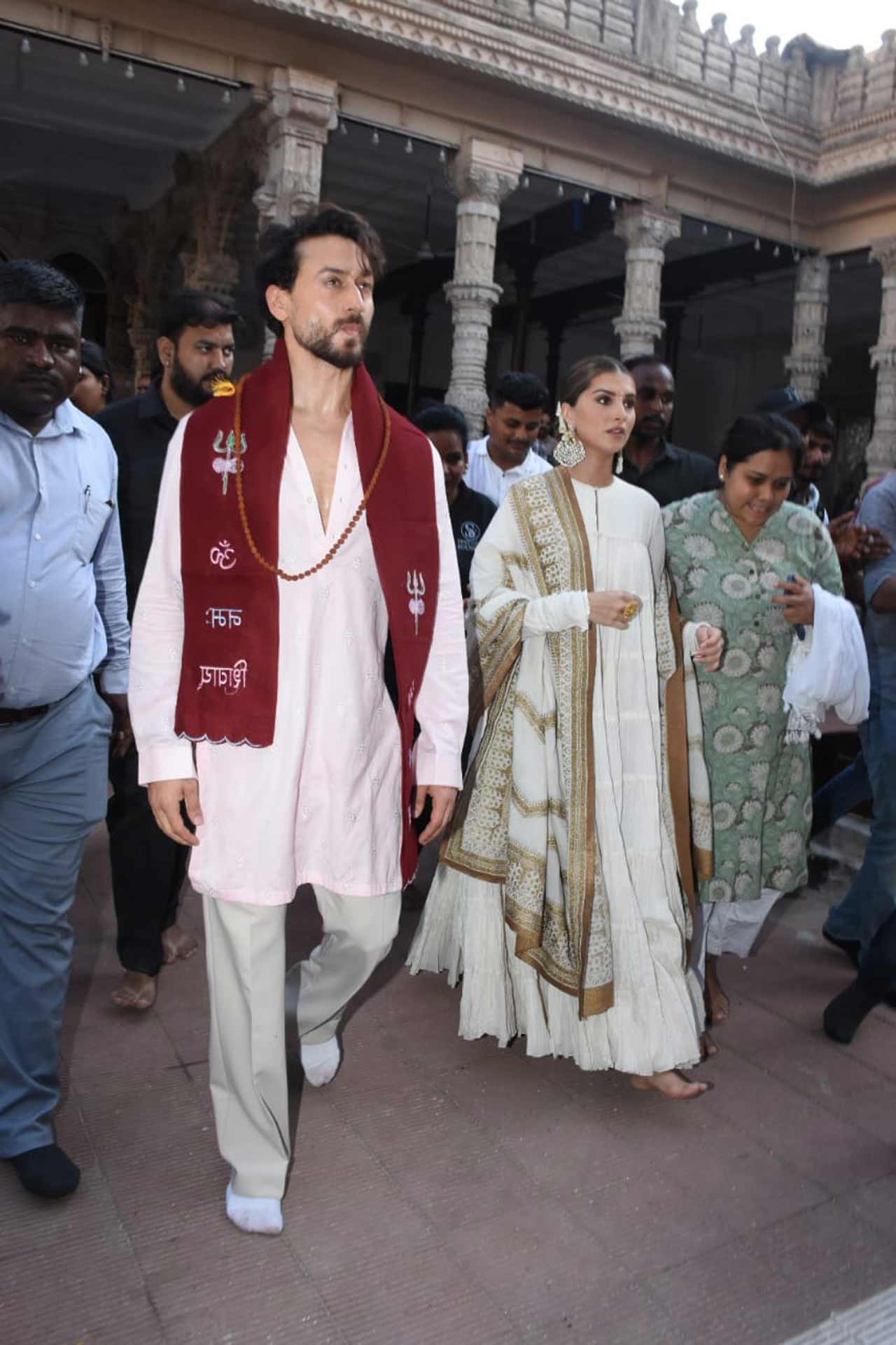 Tara Sutaria was seen wearing an ivory white Anarkali outfit for the outing.
