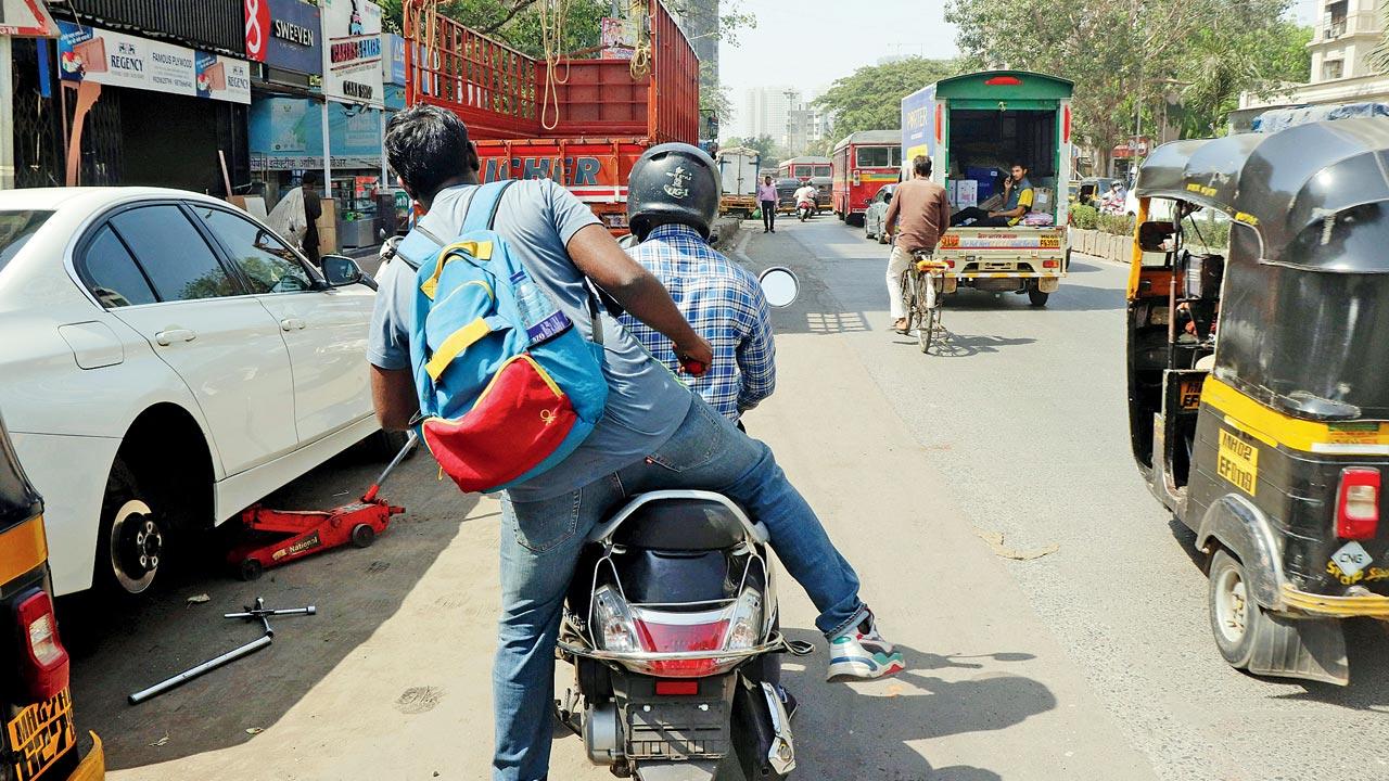  This Rapido bike taxi had no number plate on the rear. Pic/Anurag Ahire
