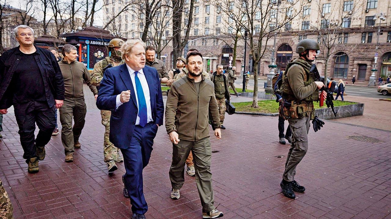 UK Prime Minister Boris Johnson and Ukrainian President Volodymyr Zelensky walk in central Kyiv on Saturday