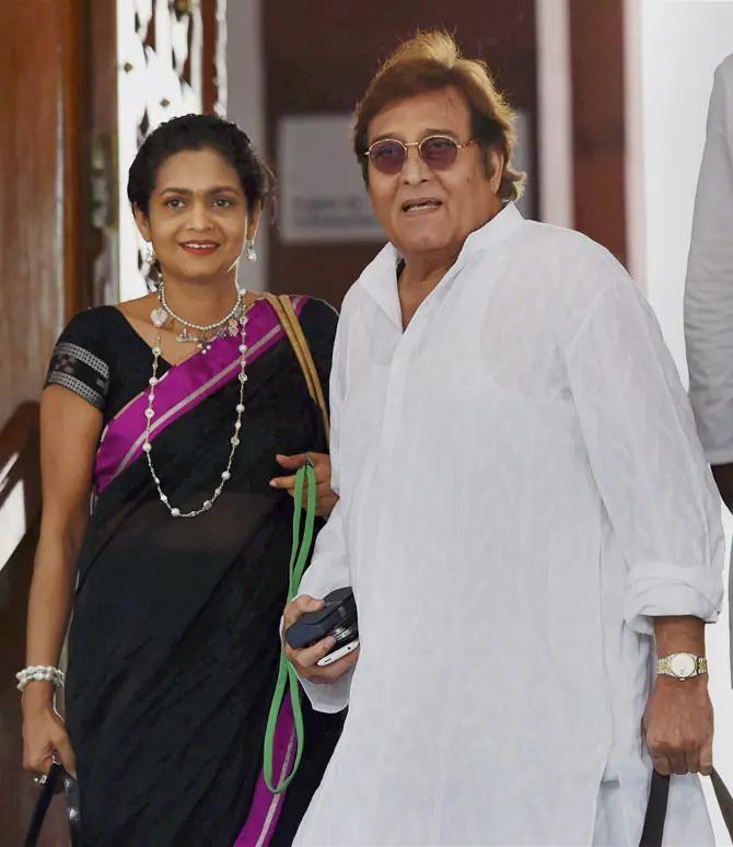 Bollywood actor and BJP MP Vinod Khanna along with his wife Kavita at Parliament House in New Delhi