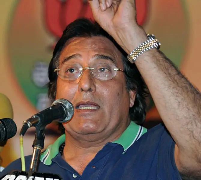 Opposition Bharatiya Janata Party (BJP) candidate from Gurdaspur and Indian film actor Vinod Khanna gestures as he speaks during a campaign rally in Amritsar