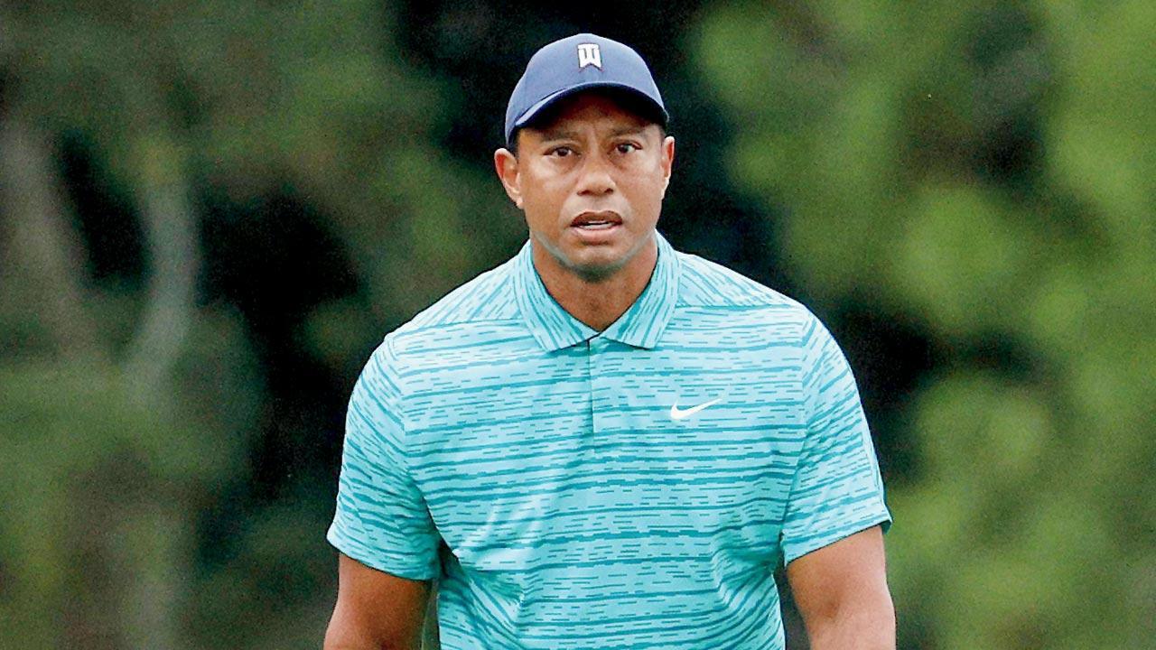 Woods chases Scheffler in bid for Masters miracle