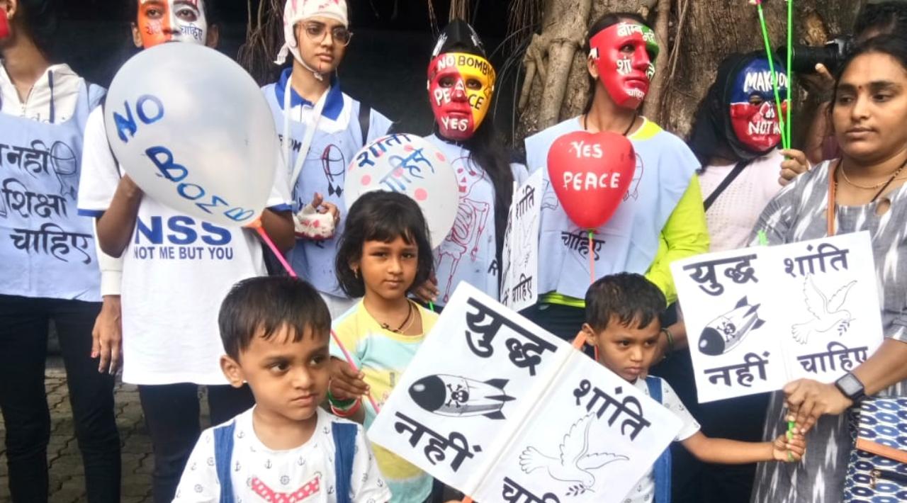 NSS student at Azad Maidan shows a 'peace and nuclear-free' message to the world on the occasion of 77th anniversary of the Hiroshima atomic bombing Pic/Ashish Raje