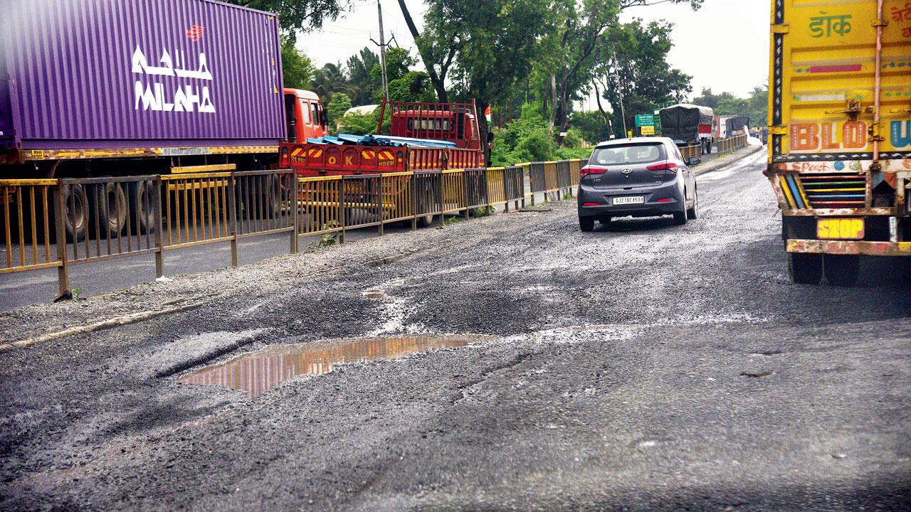 A huge pothole near the Gujarat RTO checkpost on the Mumbai-Ahmedabad Highway