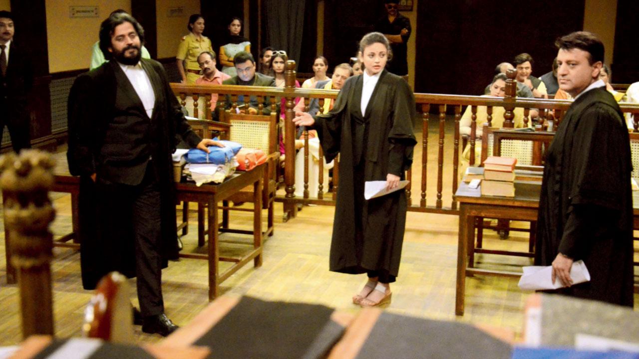 Ravi Kishan, Sneha Ullal and Ameet Kumar in a still from the movie