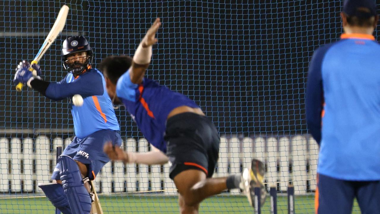Dinesh Karthik shapes up to a play a pull shot in the nets. Pic/ AFP
