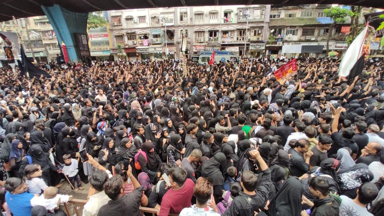 Muslim devotees during a procession on the tenth day of the mourning period of Muharram, which marks the day of Ashura