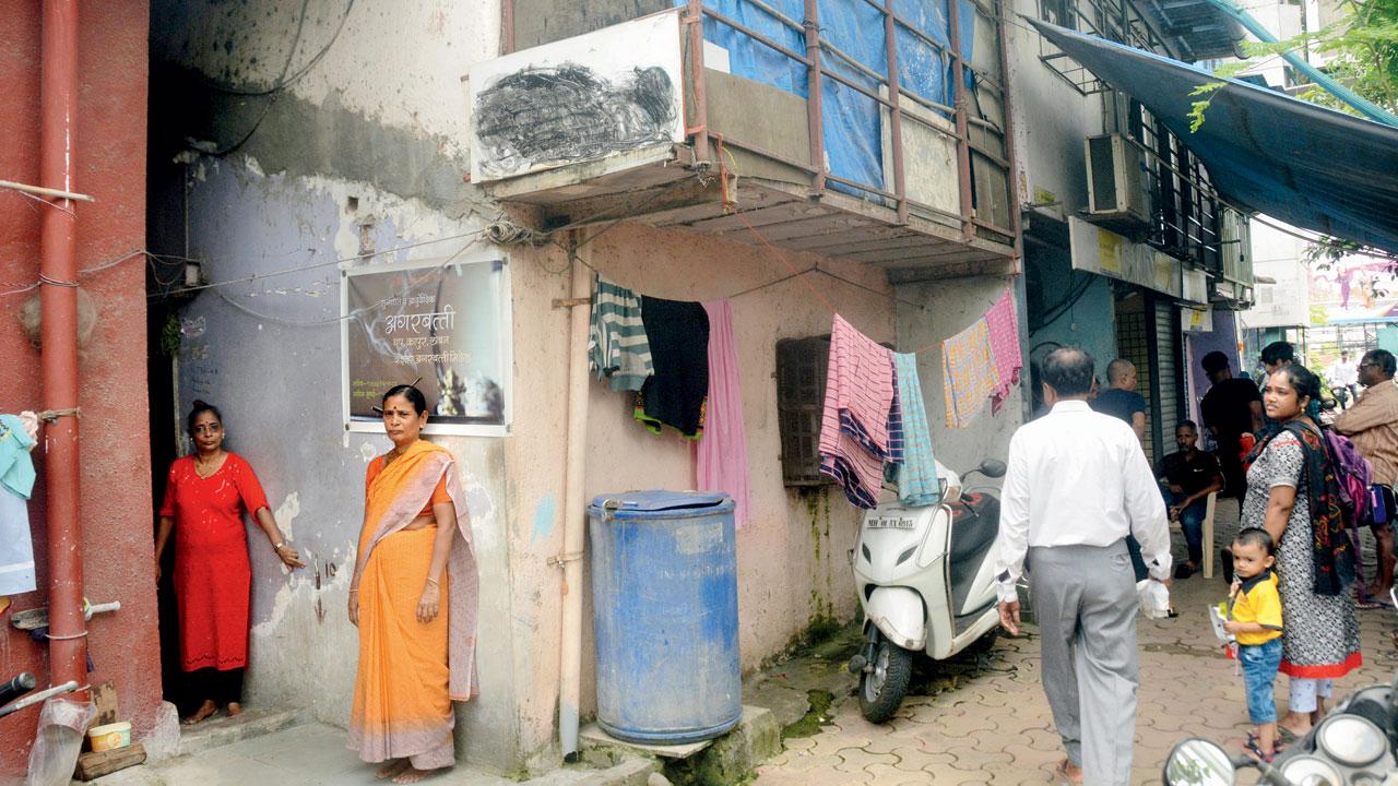 Bharati Tailor (left) and her sister sister Sandhya Uprolkar at their house which is to be cut in half. Pics/Satej Shinde