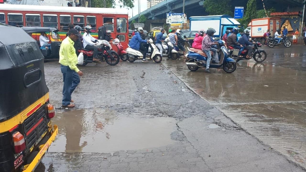 In Photos: Potholes reappear as rains lash parts of Mumbai