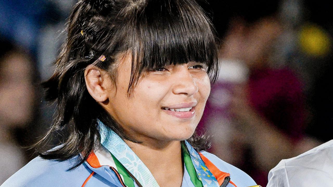 Bronze medallist Divya Kakran