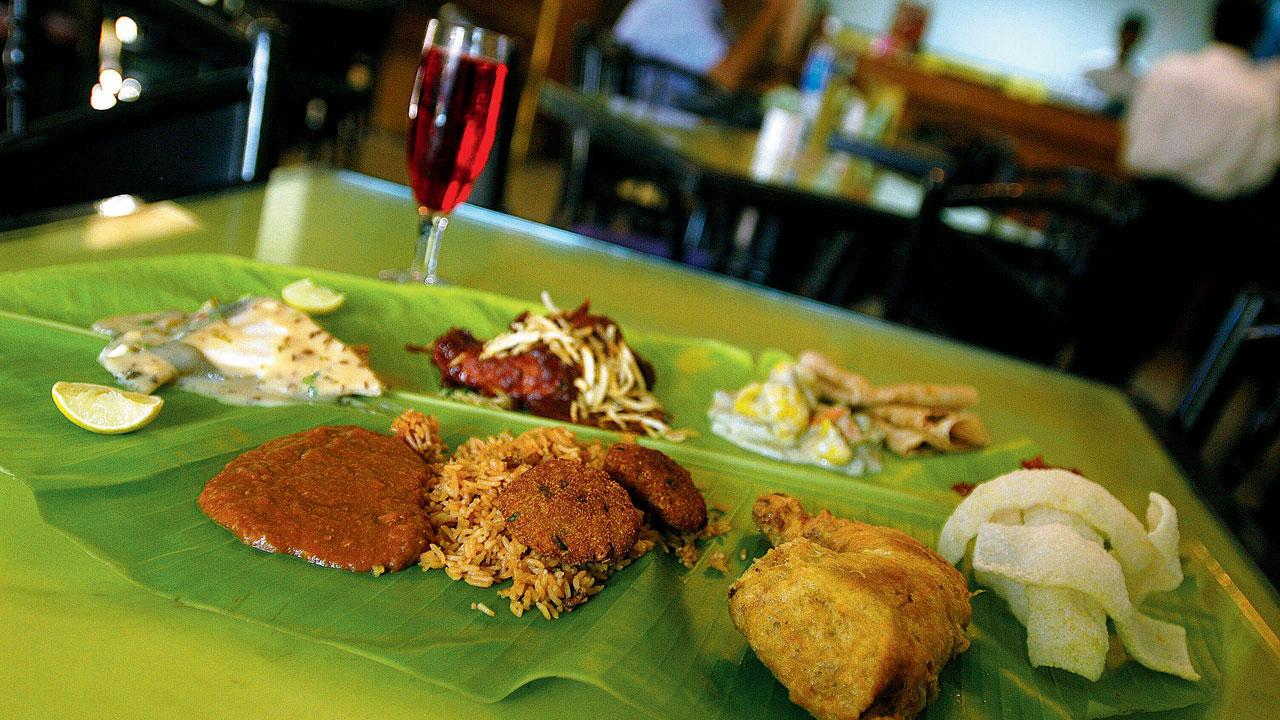 A banana leaf and Britannia & Co. for berry pulao-dar and salli boti