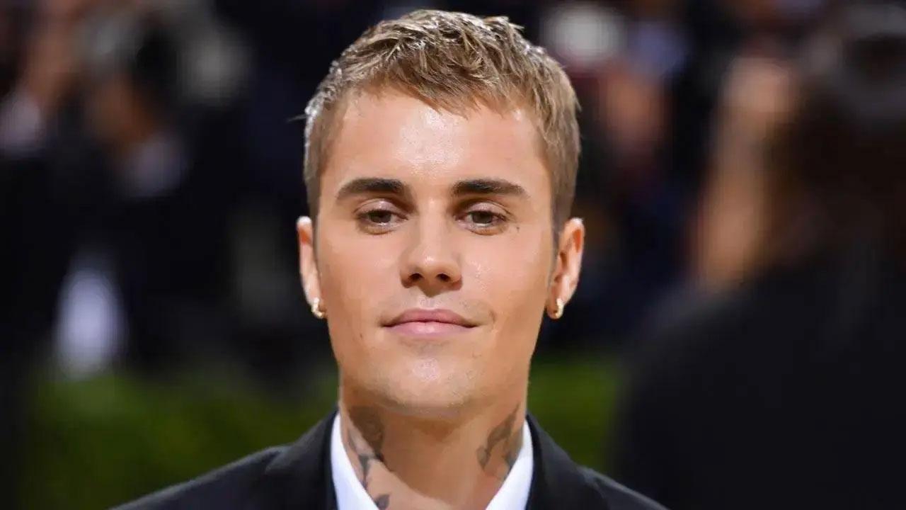 Justin Beiber shares sweet photo in bed with wife Hailey and pet dog