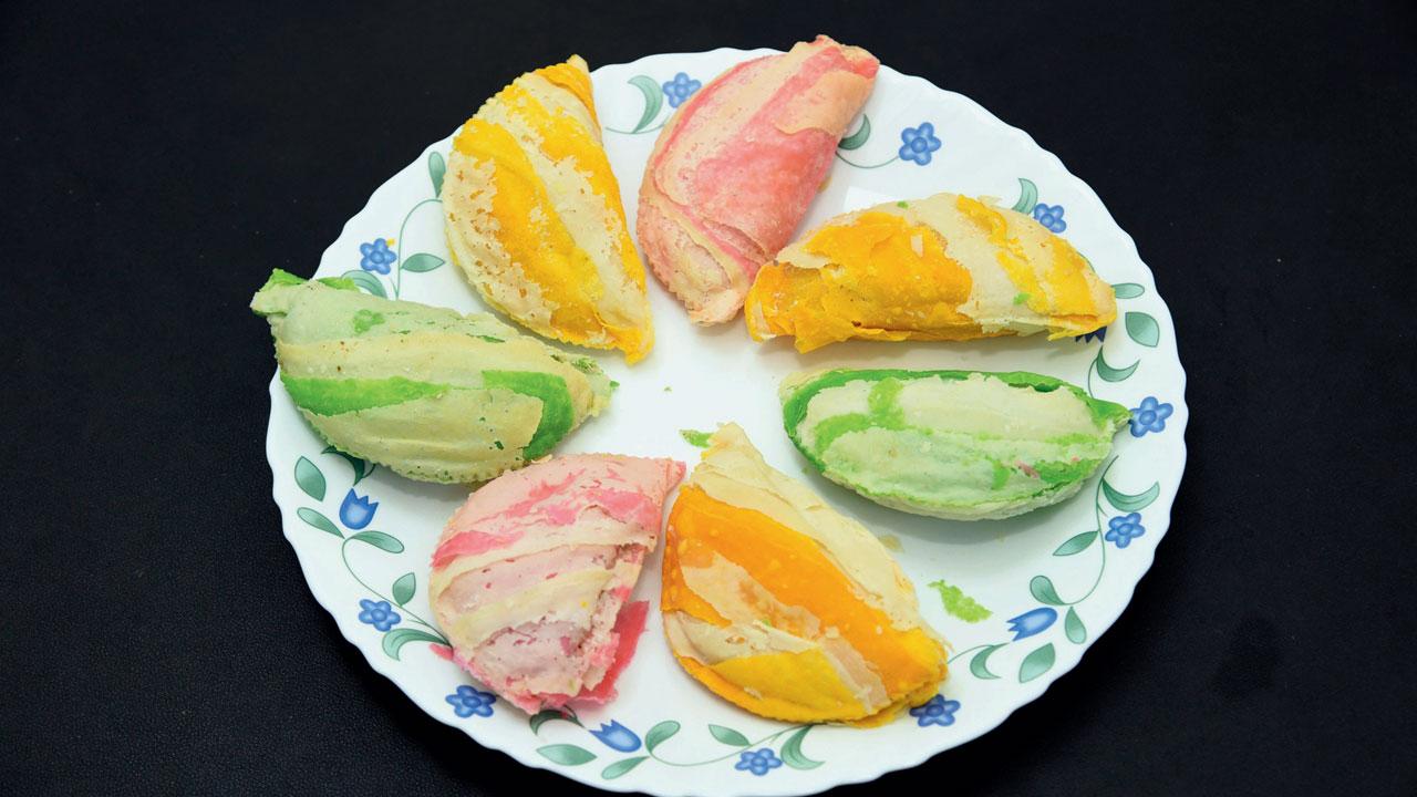 Light, flaky, and colourful, making khajyache khanawle is an art. Its layers and lightness determine the skill of the maker a batch