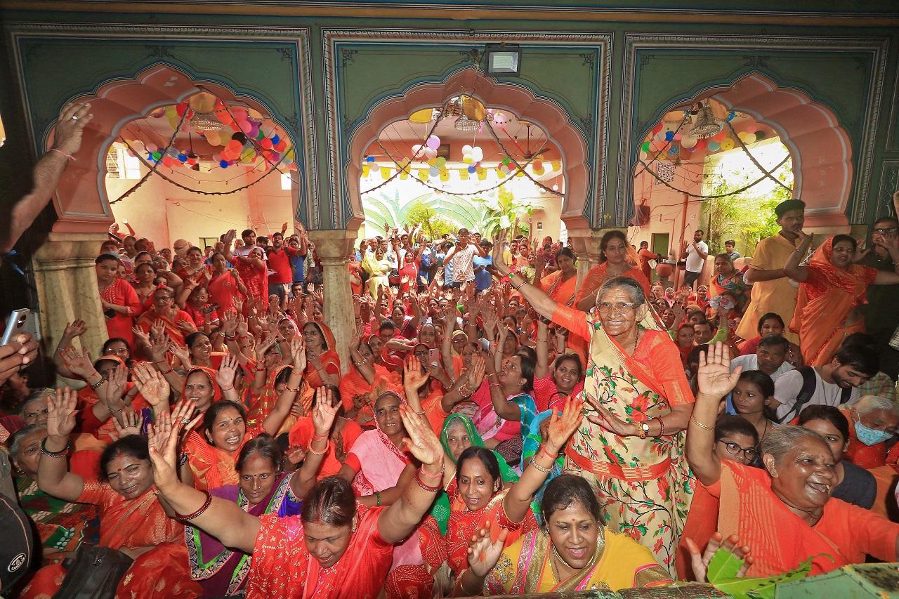Devotees dance during the 'Janmashtami' festival celebrations at the Radha Damodar temple in Jaipur. Pic/PTI