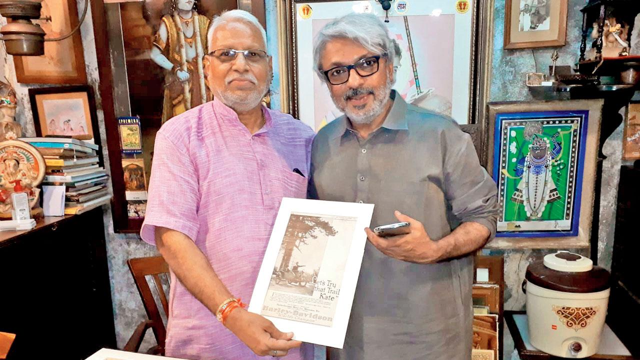 Over the years, Gramin Arts has seen famous personalities like Sanjay Leela Bhansali (seen here with Manish’s father, Ramesh) drop by. Their pieces are also displayed at Pali Bhavan and Candies; retro postcards and tin advertisements are in demand now at designer stores and cafés, according to the owner