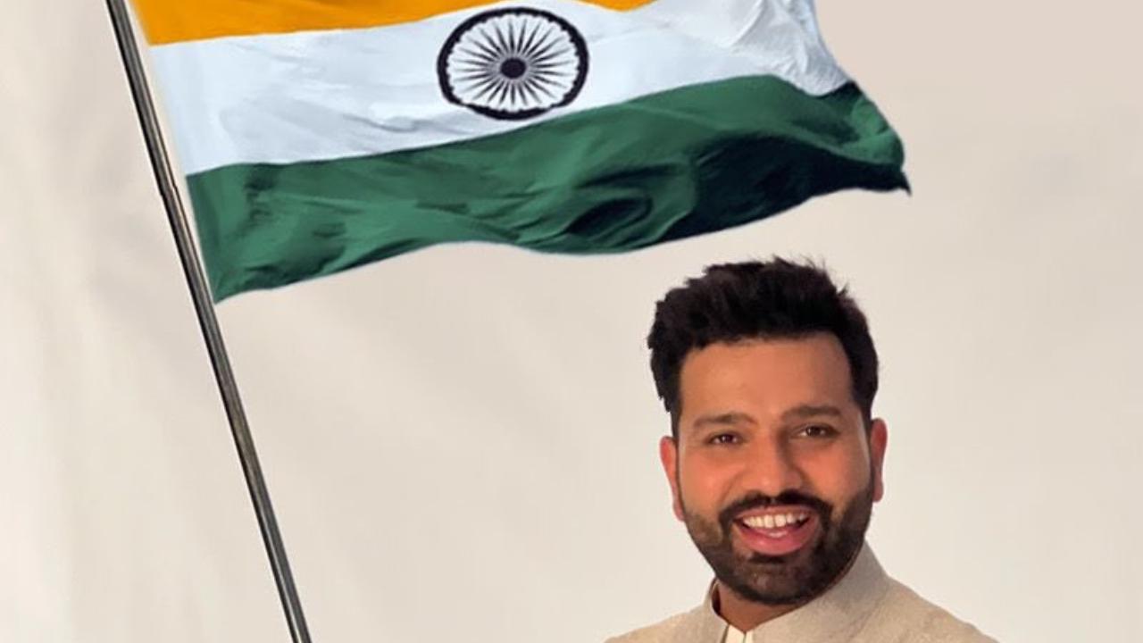 Team India skipper Rohit Sharma holds the tricolour flag. Photo/Official Twitter handle of Rohit Sharma