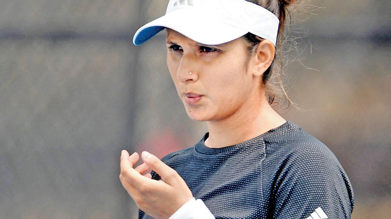 Injured Mirza delays retirement