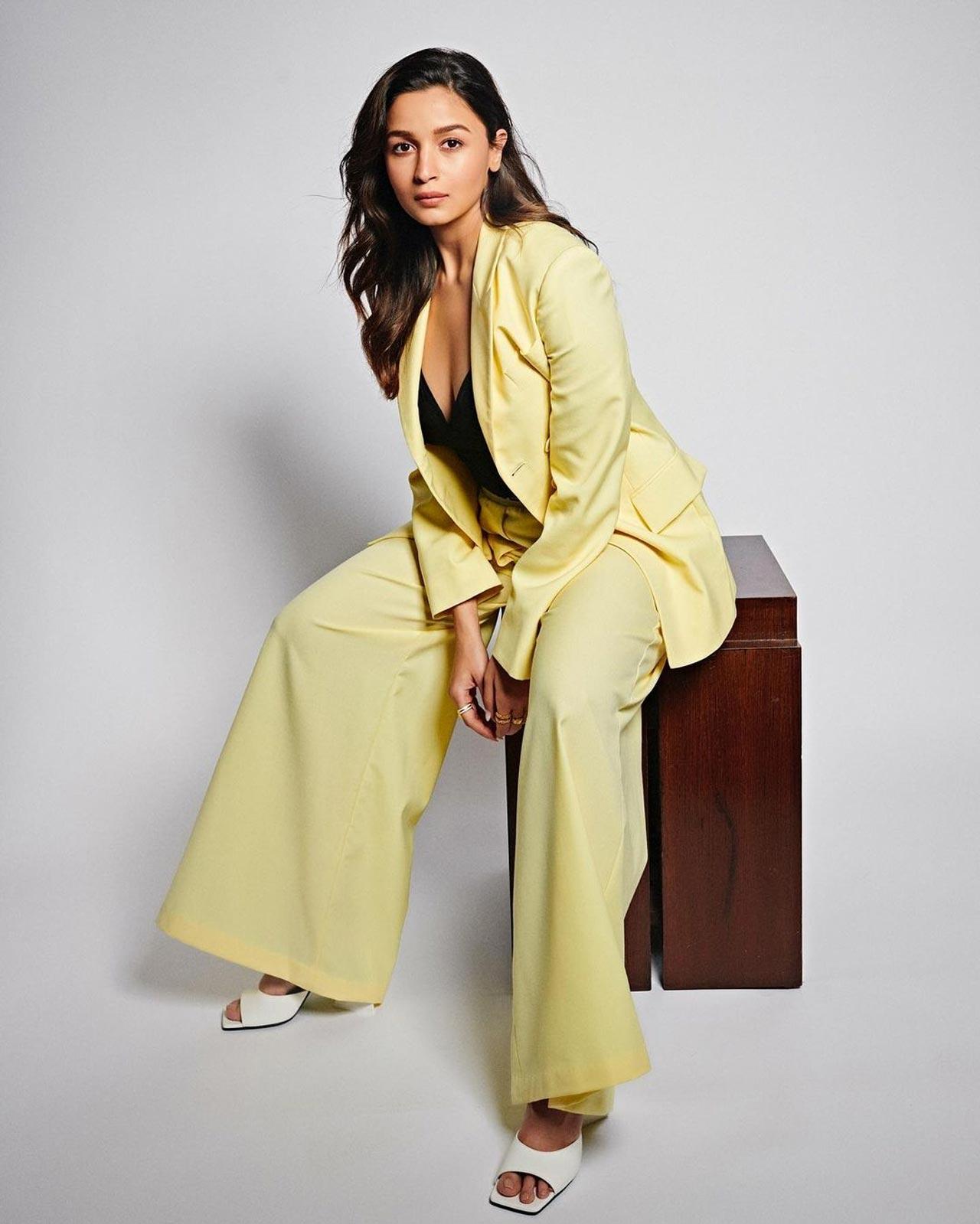 While we wait for the movie and her fashionable appearances in the days to come, let's take a look at the pictures that the mom-to-be shared on Instagram. Looking chic in a yellow pantsuit, Alia has posted some pictures from a photo shoot. She wrote, 