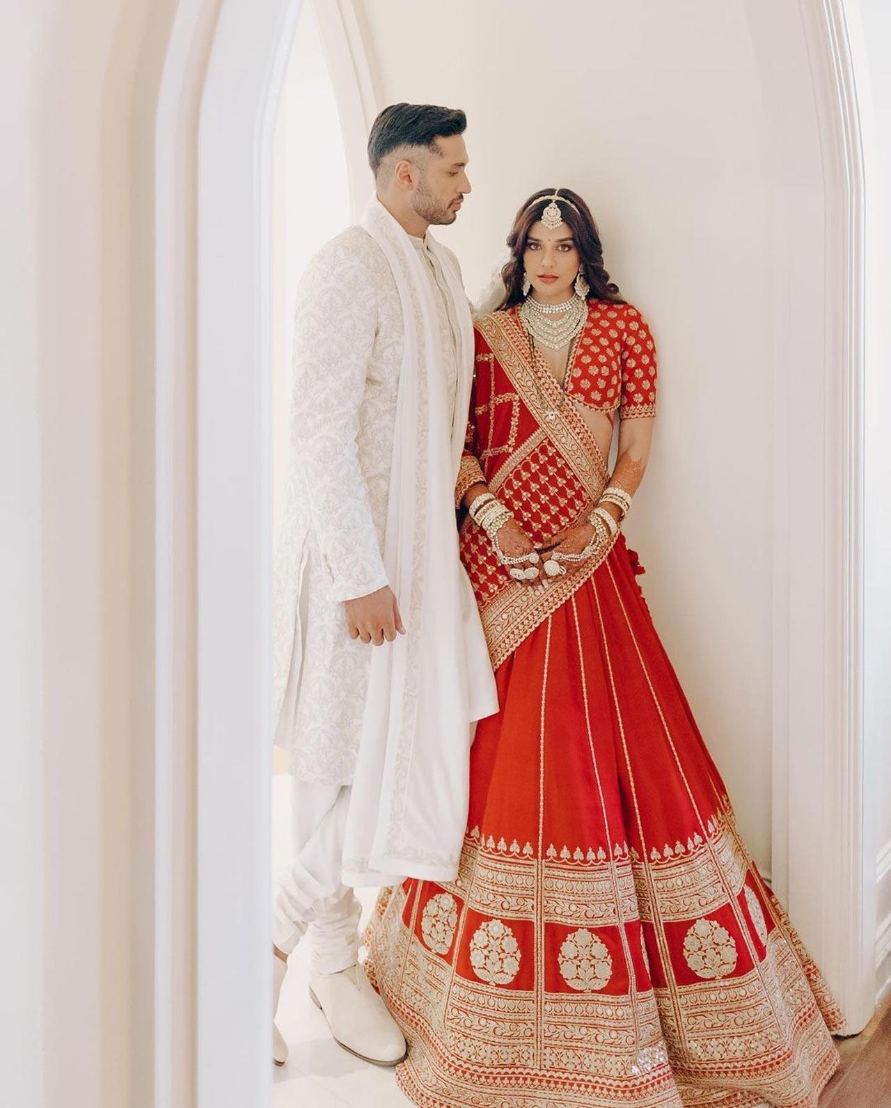 In the Mehendi pictures, the couple can be seen grinning and engrossed in each other`s eyes. Arjun was dressed in white ethnic attire and donned a white kurta and a white Nehru jacket In the Mehendi pictures, the couple can be seen grinning and engrossed in each other`s eyes. Arjun was dressed in white ethnic attire and donned a white kurta and a white Nehru jacket