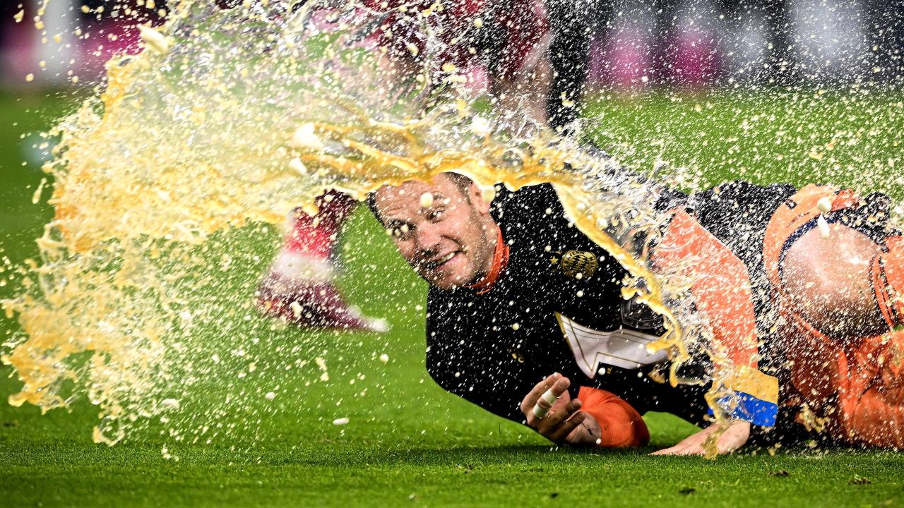Here's Bayern Munich FC goalie and skipper, Manuel Neuer getting drenched amidst celebrations