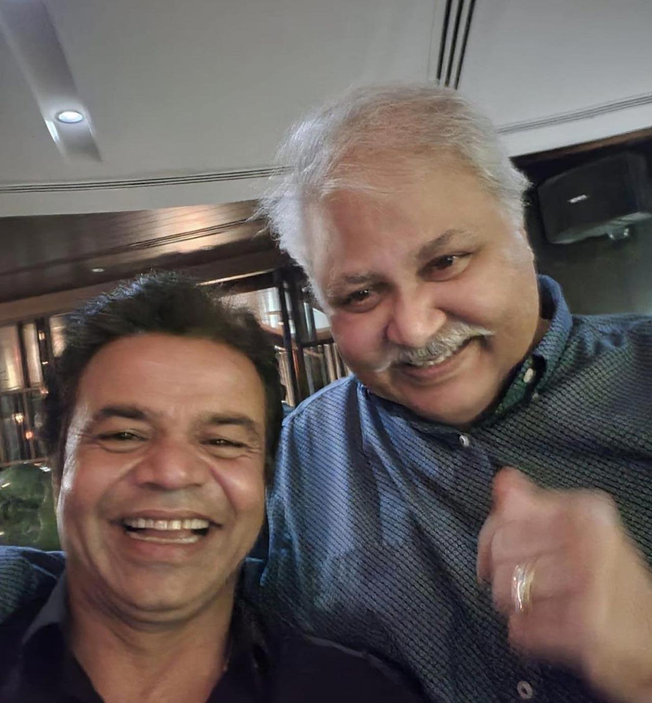 The 'Special 26' actor could be seen sharing a smile with the legendary director David Dhawan in their casual outfits