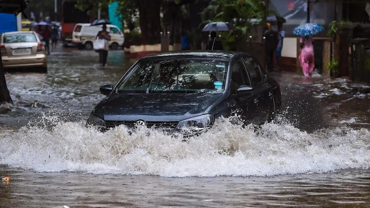 Pune: Five of family rescued after car gets stuck on flooded riverside road