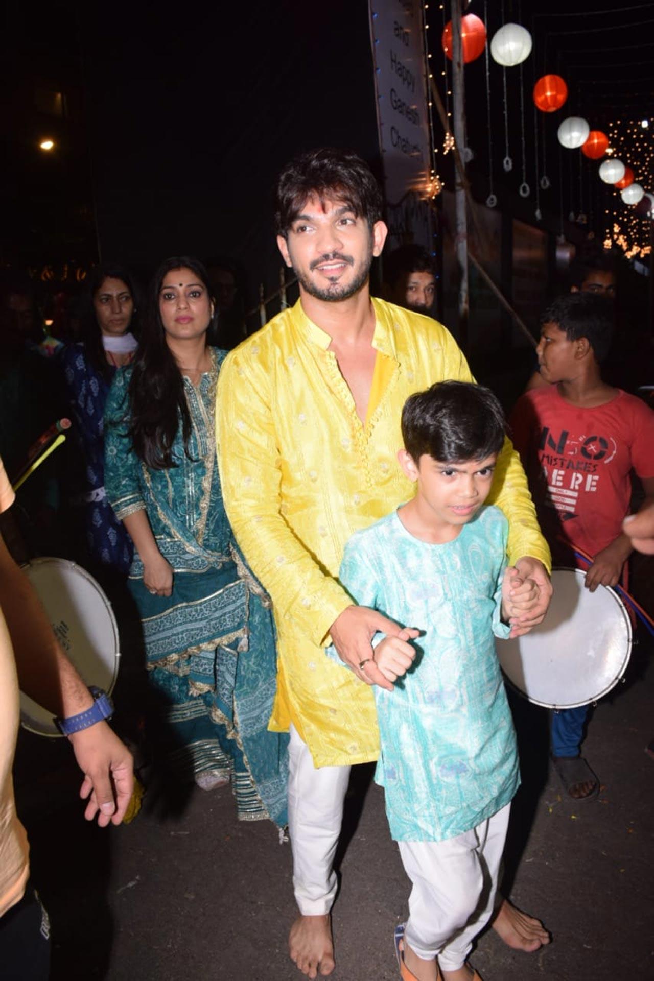 While Arjun Bijlani opted for a yellow silk kurta paired with pyjama, Neha stunned in a blue ethnic wear