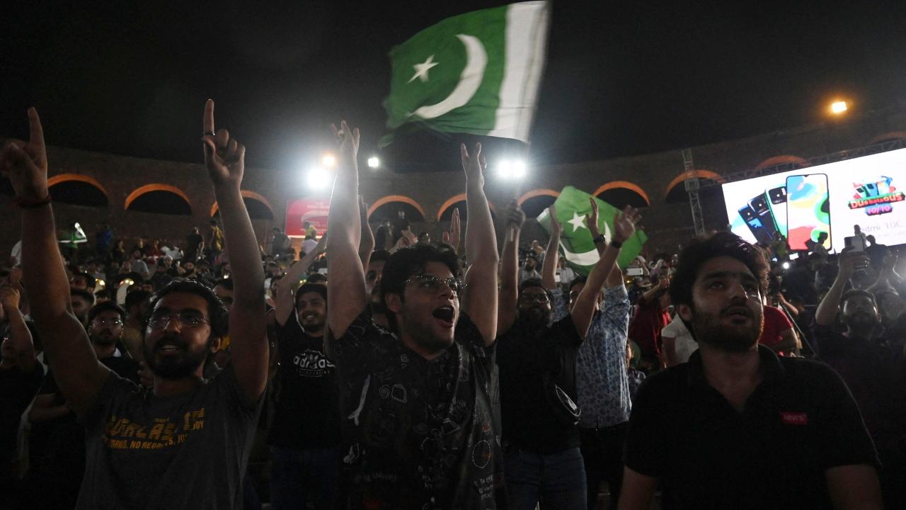 Pakistan cricket fans react while watching the live telecast of the Asia Cup Twenty20 international cricket match between India and Pakistan in Dubai, on big screens in Lahore. Photo/AFP
