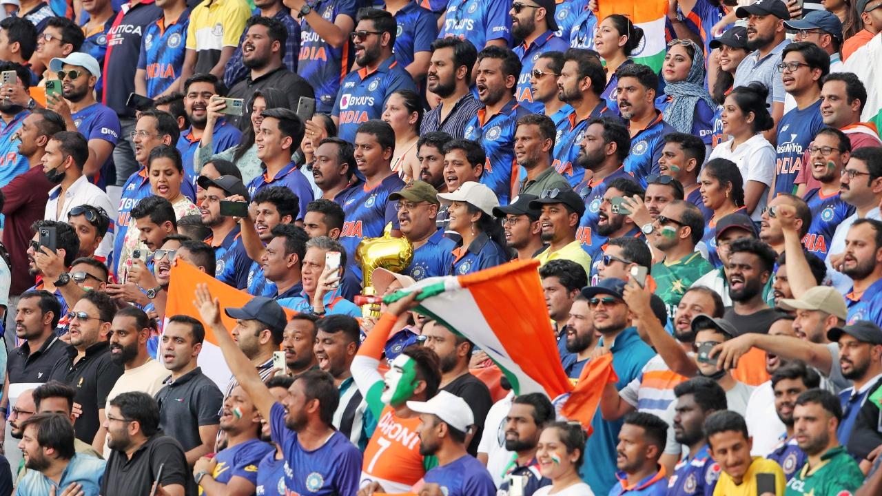 Indian fans cheer for team India during the Asia Cup 2022 Group A match between India and Pakistan, at the Dubai International Cricket Stadium in Dubai. Photo/ANI