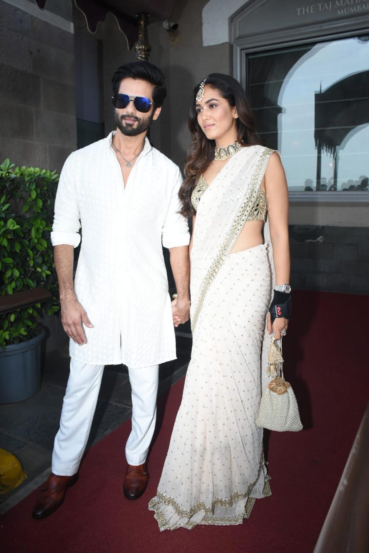 Shahid Kapoor and Mira Rajput posed together as they attended Kunal Rawal and Arpita Mehta's wedding ceremony in Mumbai. While Mira stunned in a white and golden saree, paired with a choker neckpiece and mang tika, she opted for minimal makeup for the day wedding ceremony