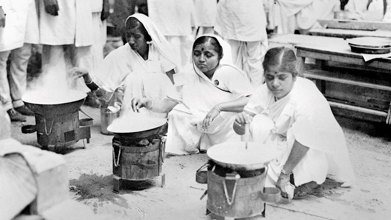 Fracturing the salt law: Satyagrahis boiling sea water to extract the taxed mineral in the Congress House compound. Pic Courtesy/Getty Images