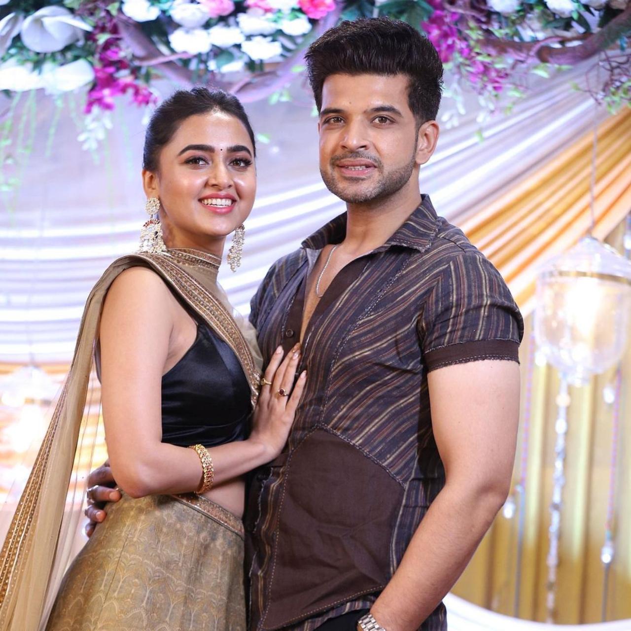 In the pictures shared by Tejasswi, the couple can be seen dressed at their festive best. Tejasswi in a gold and black lehenga and Karan in a patterned shirt