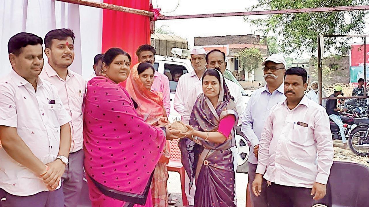 Kamble participating in the Oti Bharan ceremony, a ritual where married women exchange sarees, coconut, haldi-kumkum, bangles and rice, to pray for a male child. Earlier this year, activist Pramod Zinjade tried organising a haldi-kumkum event in Pothare and encouraged widows to participate for the first time