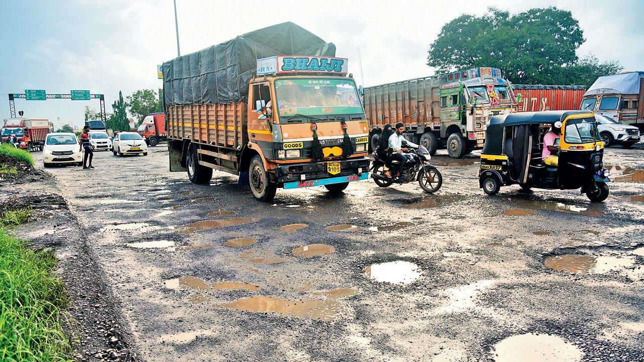 A part of Mumbai-Nashik Highway riddled with potholes, which pose risk to motorists