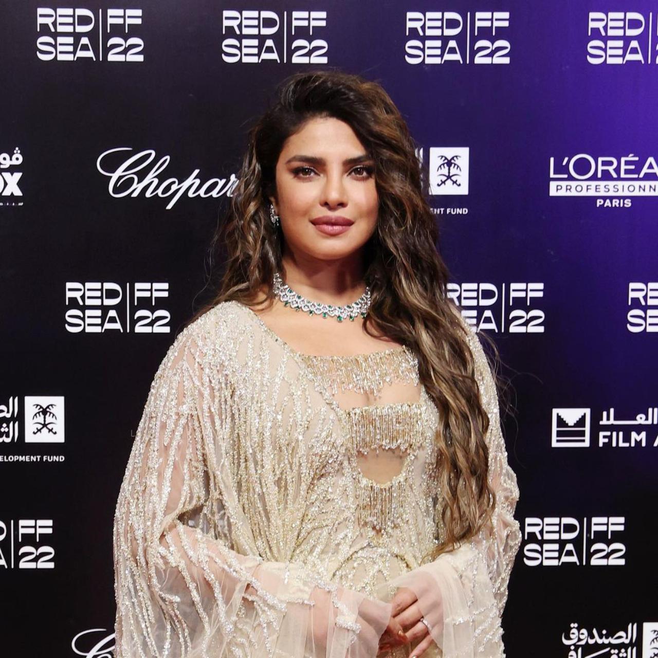 Global star Priyanka Chopra was also seen at the festival on opening night in a shimmery outfit with diamond jewellery. The actress also attended the ‘Women in Cinema’ event at the film festival dressed in a bright yellow satin gown. She paired it with a similarly coloured floor-length cardigan along with a diamond necklace and a glimmering bracelet