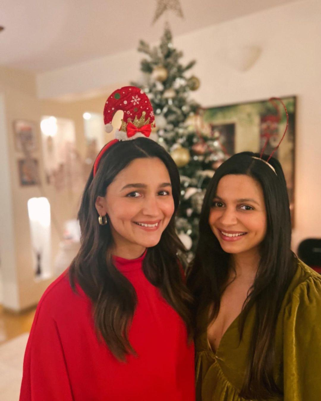 Alia also dropped a picture with sister Shaheen with a Christmas tree in the backdrop