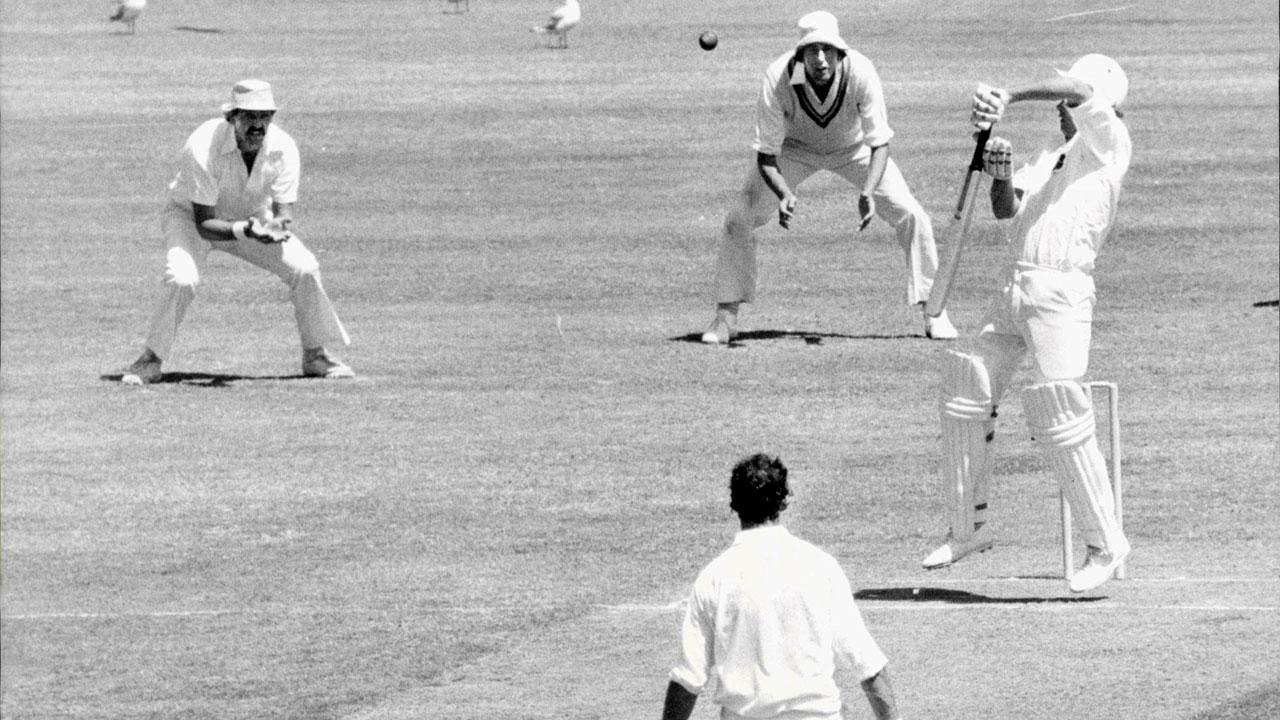 Australia’s Phil Carlson tries to block a lifter from England’s Ian Botham and is about to be caught in the slips during the fifth Test at Sydney on February 10, 1979. Pic/Getty Images