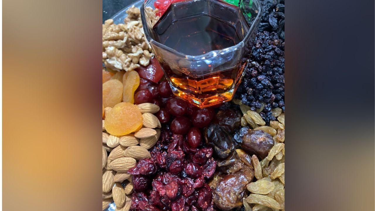 This year, Rodrigues started by soaking the fruits in the first week of December with dry fruits and fruit peels in rum. He will be feeding it with alcohol every four-five days till Christmas day to get the rich flavour in the cake. Photo Courtesy: Mogan Rodrigues