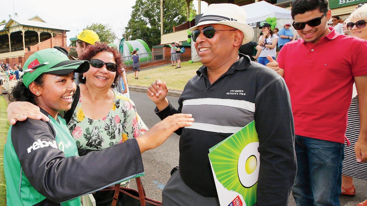King is greeted by parents Sharon and Leroy after a win during the Women’s Big Bash League match between the Melbourne Stars and the Brisbane Heat at Junction Oval on December 5, 2015 in Melbourne, Australia. Pics Courtesy/Getty Images