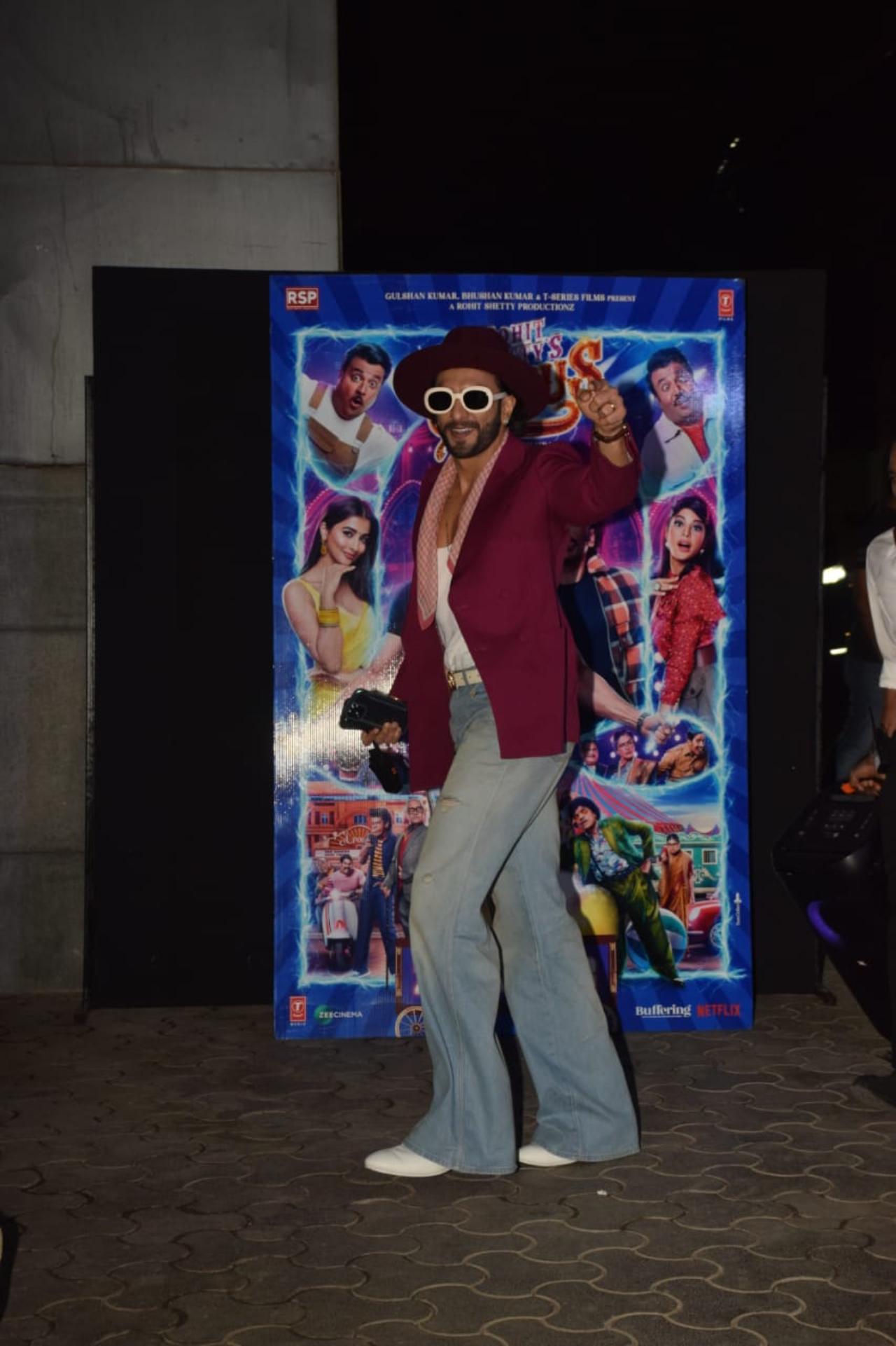 Actor Ranveer Singh was snapped at the screening in a magenta coat over a white T-shirt and light blue jeans. The ‘Gully Boy’ actor accessorized his look with a pink scarf, magenta hat and black and white sunglasses. He was seen waving at the paps