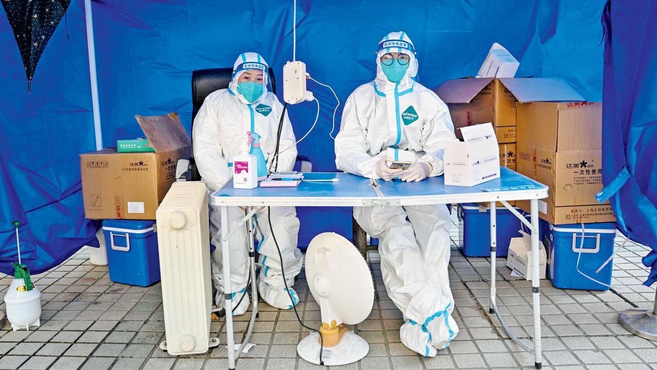 Shanghai hospital warns of ‘tragic battle’ as Covid spreads