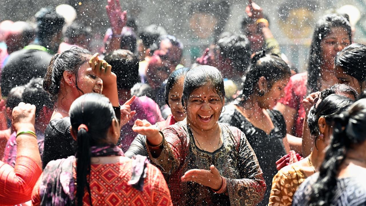 Ladies enjoying Rain dance during  Holi celebration at Mahalaxmi Pic/File Photo