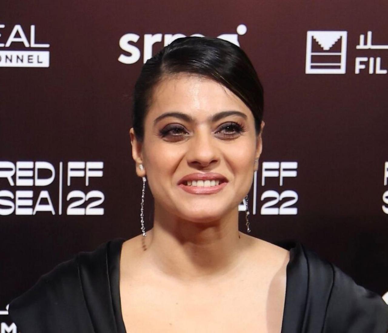Kajol was her joyous self as she attended the festival for the screening of DDLJ on opening night. She shared the stage with Shah Rukh Khan and the two also recreated scenes from their film DDLJ and Baazigar